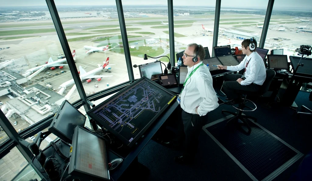 air traffic control staff using radio equipment