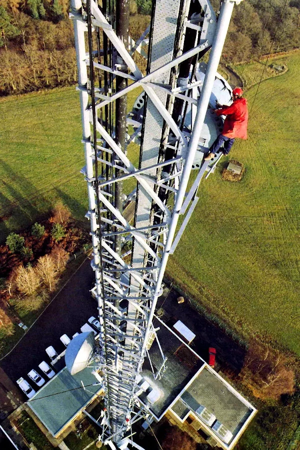 engineer working at height on a transmitter tower
